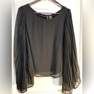 Women’s Black Dress Shirt size Large with Flowy see thru sleeve.